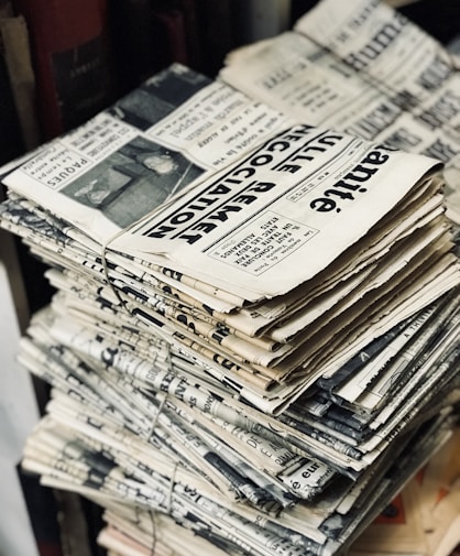 bundle of newspaper on table